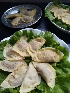 Horseshoes, pork, egg dumplings