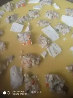 Crab yellow meatball soup