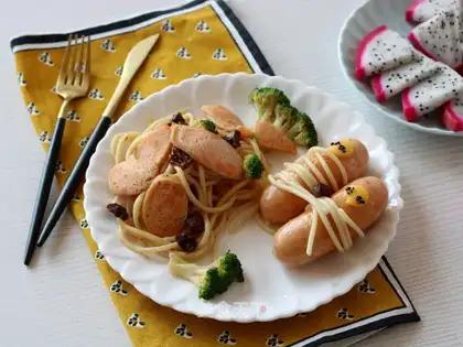 It's a salmon sausage mushroom sauce. Noodles