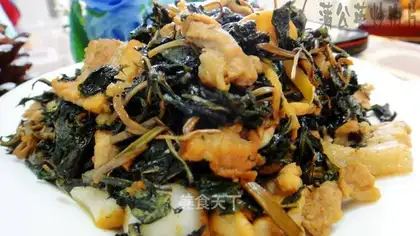 Fried pork slices with dandelion