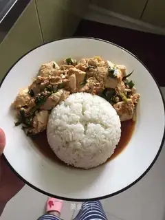 Mother of God, she's soaking rice