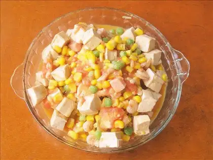 Stewed tofu with mixed vegetables in tomato sauce
