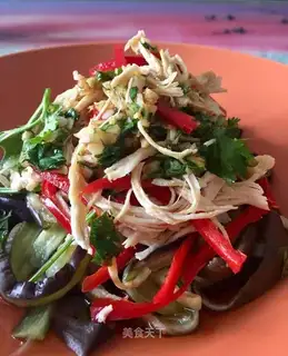 A hand tore with eggplant