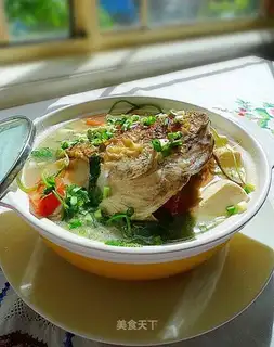 Salmon fish head tofu soup