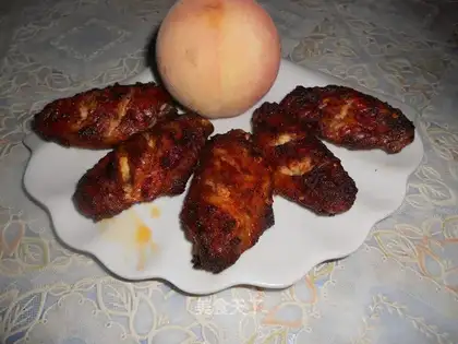 Roasted chicken wings in soy sauce