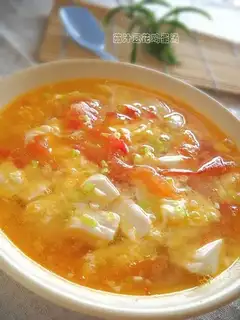 Bean pudding egg soup with tomato sauce