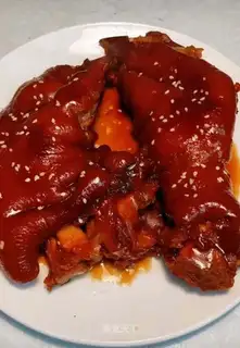 Red burning pig hands