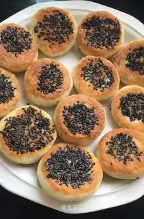 Red sugar, black sesame rice pie