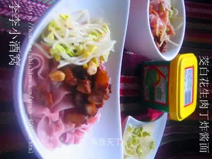 Noodles with diced pork and water bamboo rice with diced peanuts