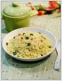 Fried rice with gold and silver eggs