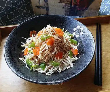 A salad with chicken silk