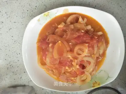 Onions, tomatoes, fried eggs