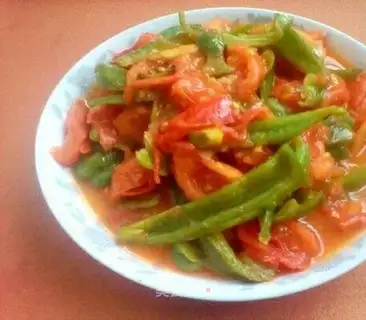 Pepper fried tomatoes