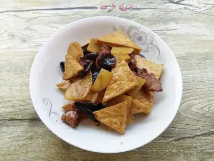 Tofu-dry, black-mole potatoes