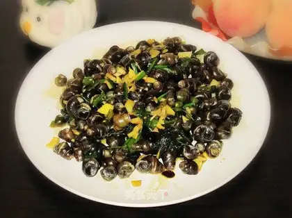 stir-fried river snail with perilla