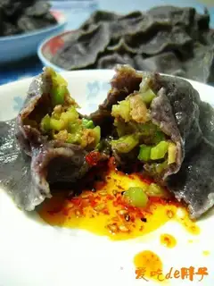 Celery pork and purple rice dumplings