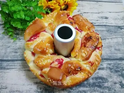 A hand tore jam bread