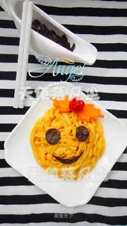 Smiley face pumpkin noodles
