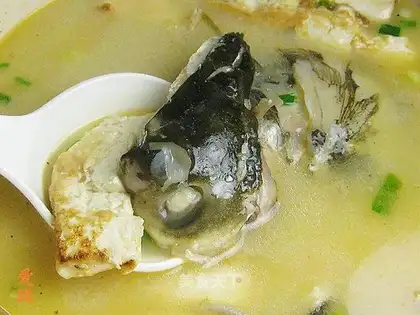 Rolled tofu with silver carp head