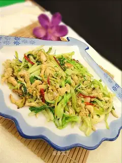 stir-fried bean curd with green vegetable stalks