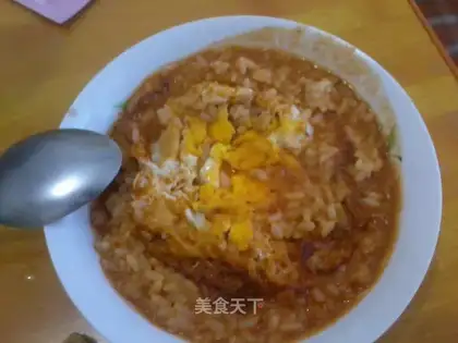 Soak rice with eggs in sour soup