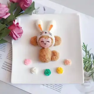 A monkey in a rabbit hat