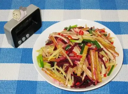 stir-fried dried tofu with red vegetable head