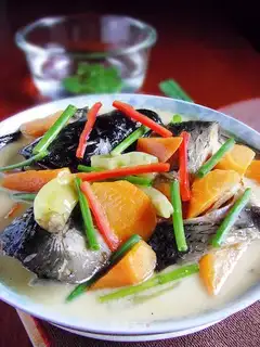 Grilled fish head with pickled pepper