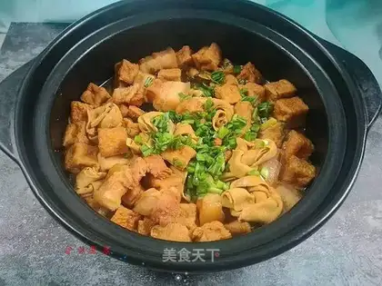 A casserole with five flowers