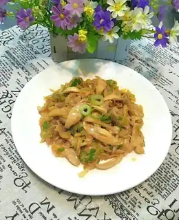 Tore chicken with onions
