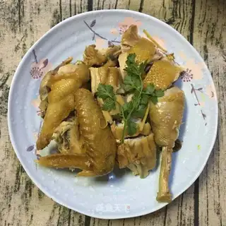 A chicken with a pan