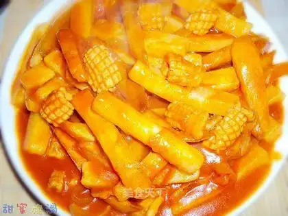 Fried rice cake with squid and sweet potato