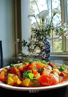 Fried chicken fillet with tomato and pineapple