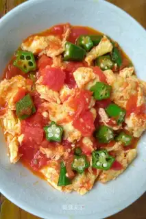 Tomatoes, fried eggs