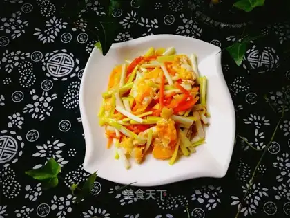 Carrot and yellow fried eggs