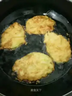 Blow up a green round eggplant