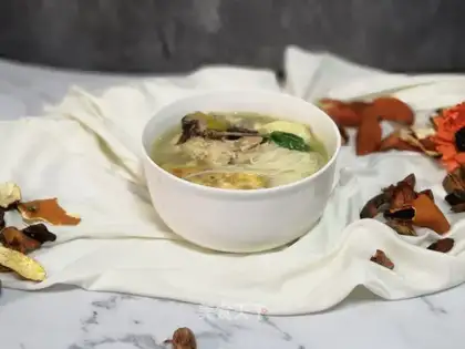 Chicken soup and egg noodles