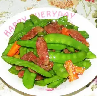 fried sausage with peas