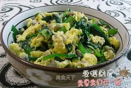 Fried clams with leeks and eggs