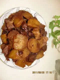 Stewed potatoes with meat slices