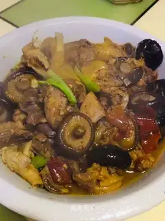 A chicken with mushrooms