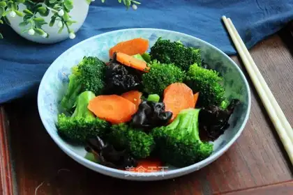 Blackwood carrots and blue flowers