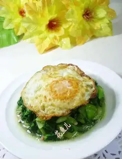 Fried eggs in the kitchen