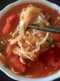 A golden mushroom with tomatoes