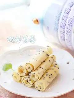 Milk, black and sesame egg rolls