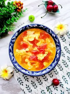 Tomatoes, eggnut soup
