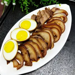 Pork head and eggs