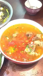 Tomato cowtail soup