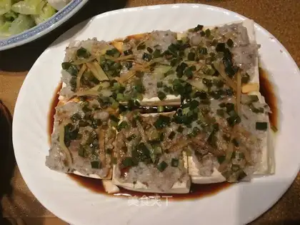 Squid meat evaporates tofu