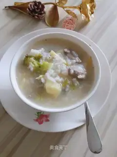 Porridge of apples and blue flowers